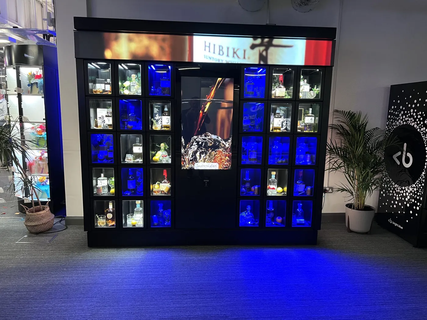 Multi-door smart merchandiser with illuminated product lockers