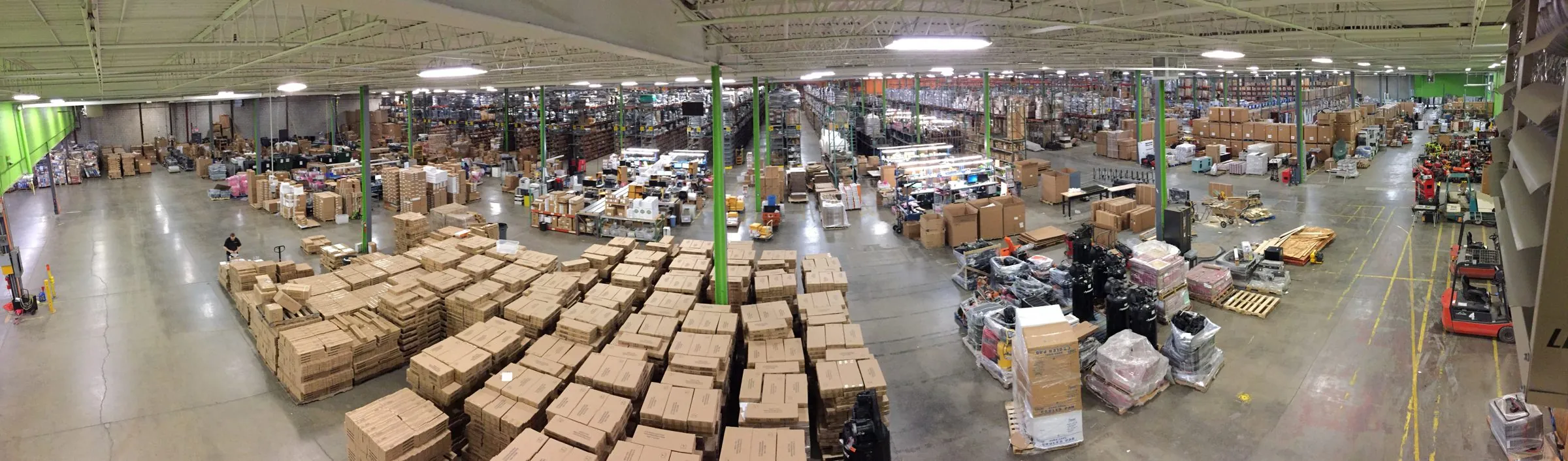 Panoramic view across ShopJimmy's production and warehouse floor in Burnsville, Minnesota